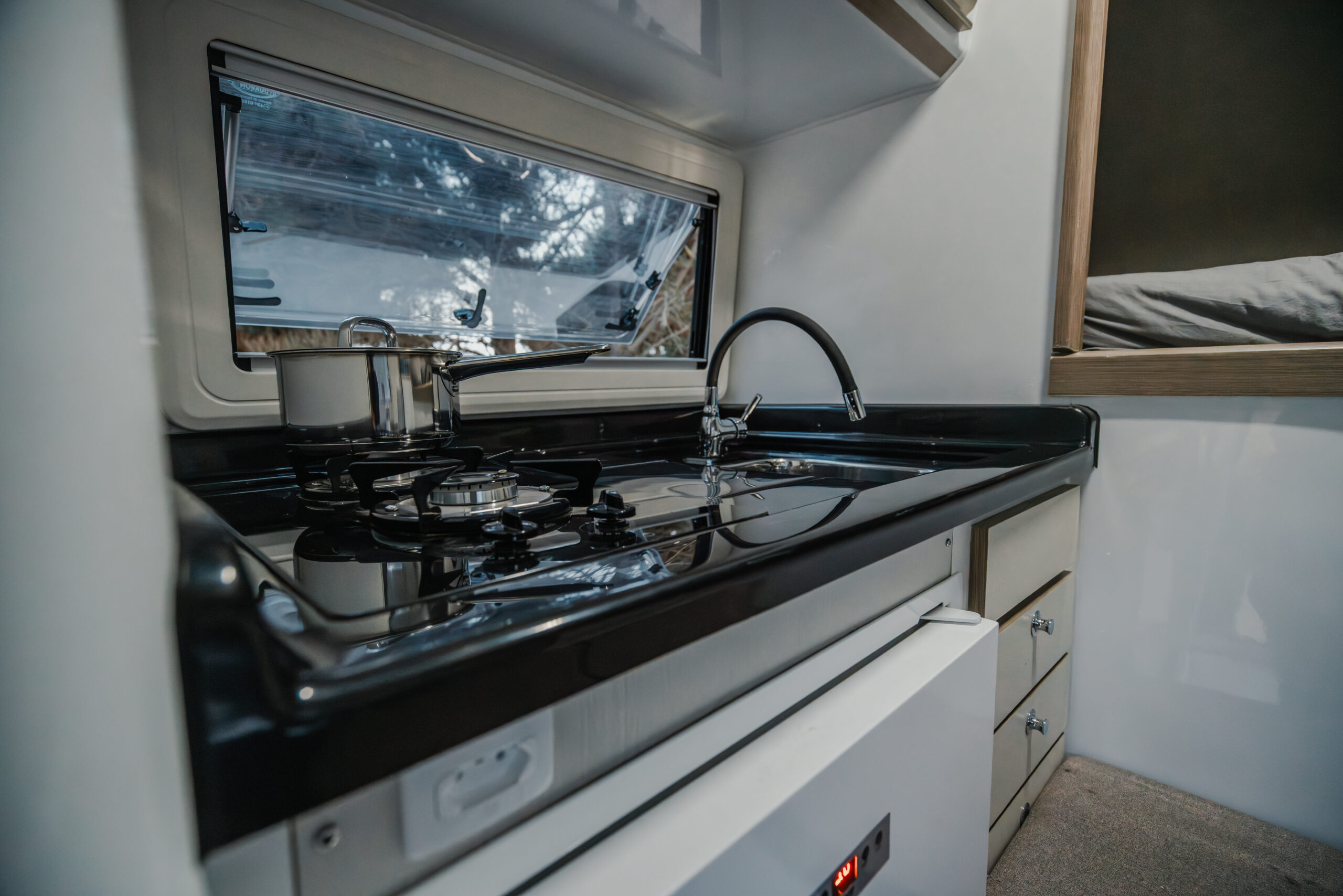 5. 180 Sur Campers Rental - Duaron Zion camper 4x4 - interior -kitchen jpg