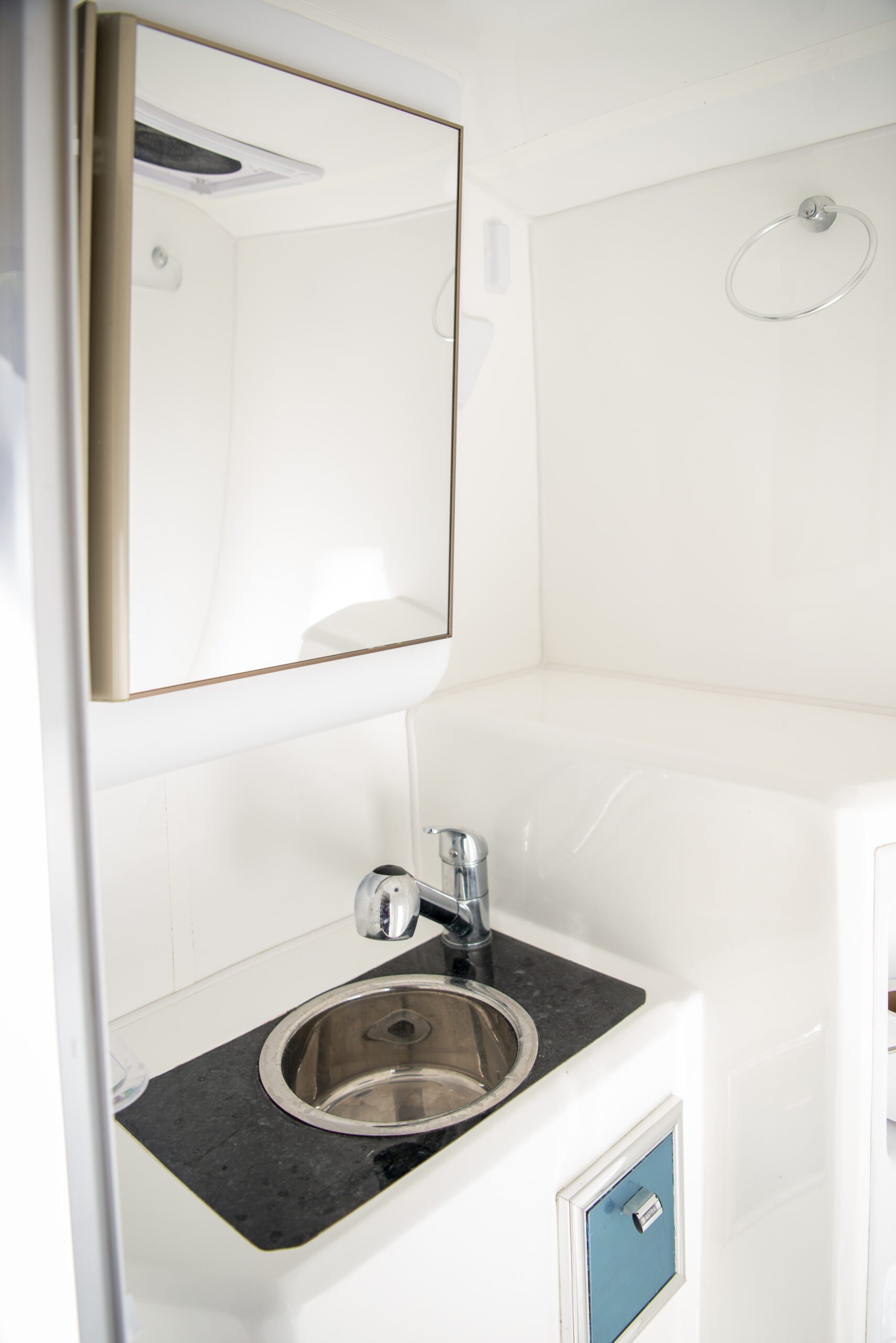 7. 180 Sur Campers Rental - Duaron Roam camper 4x4 - interior - bathroom mirror
